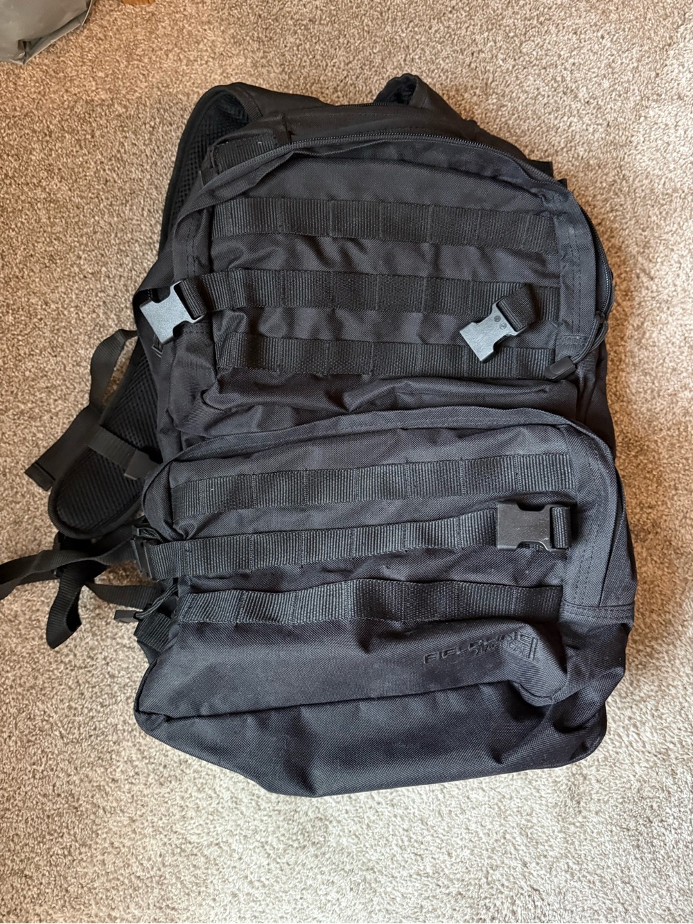 Black Tactical-Style MOLLE Backpack with Multiple Pockets